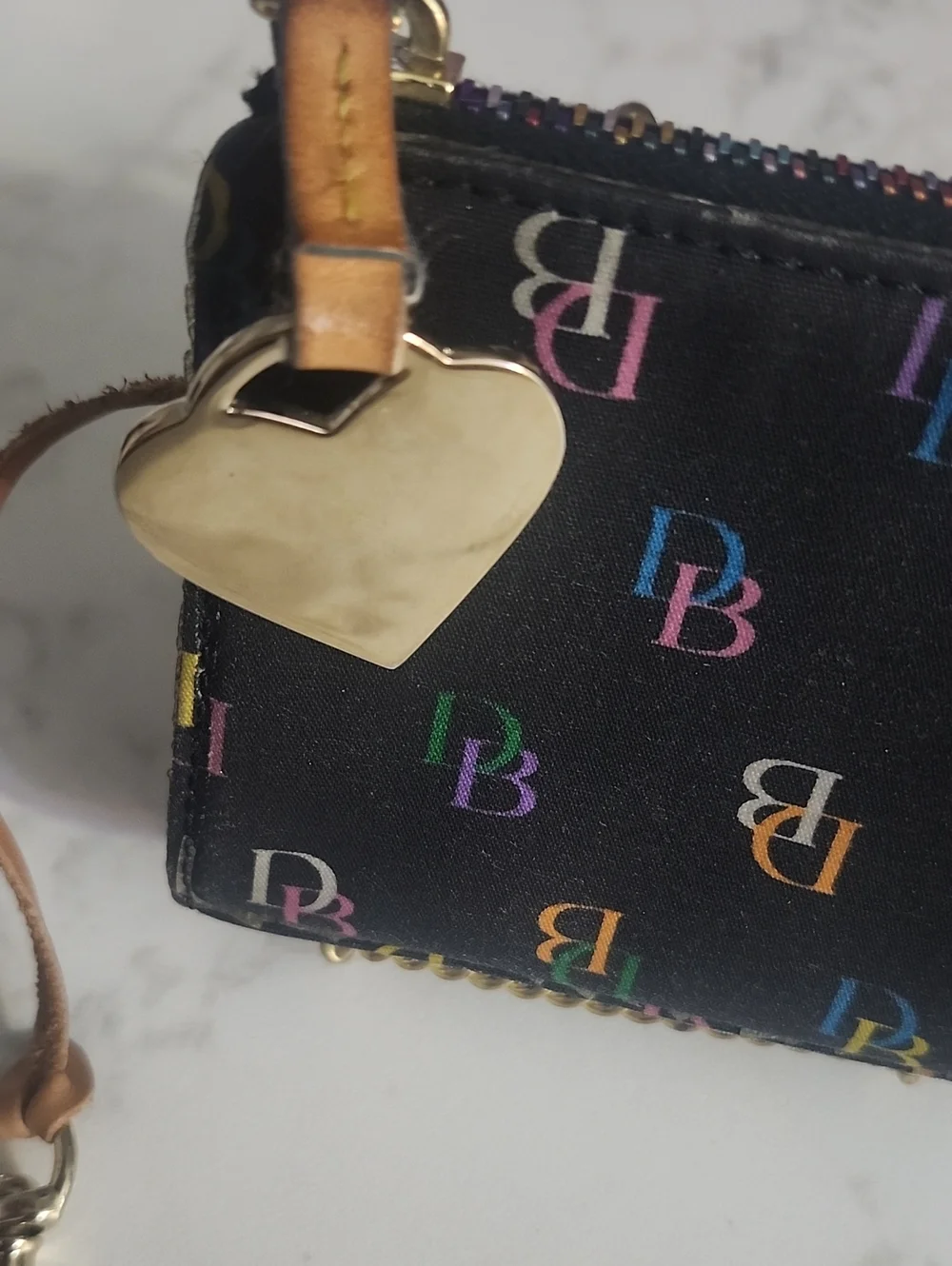 Dooney & Bourke black rainbow monogram wristlet